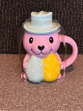 Pastel Pink Bunny Mug with Light Blue Hat and Yellow Detail